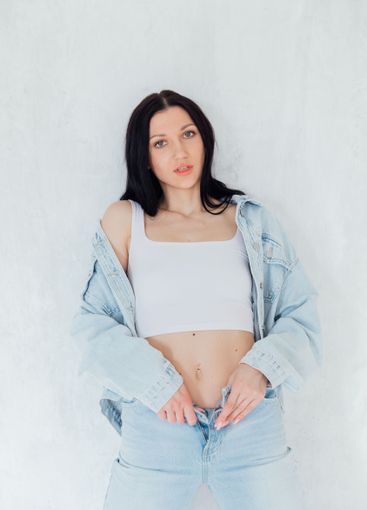 Portrait of Beautiful Slim Fashionable Brunette Woman in...