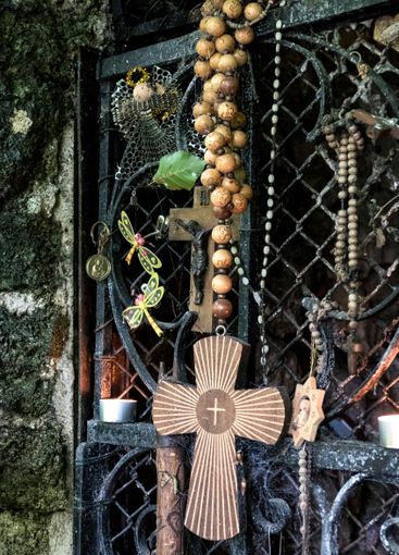 Religious and Christian objects and candles on the...