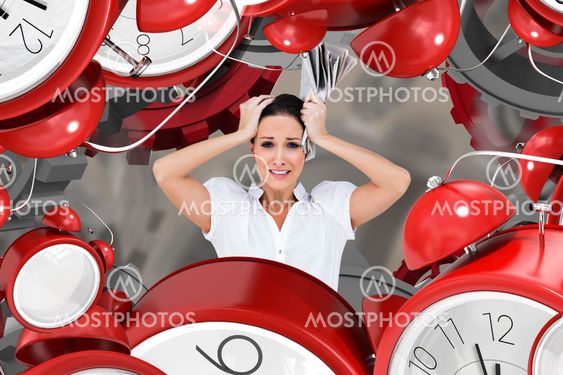 Composite image of worried stylish businesswoman holding newspaper
