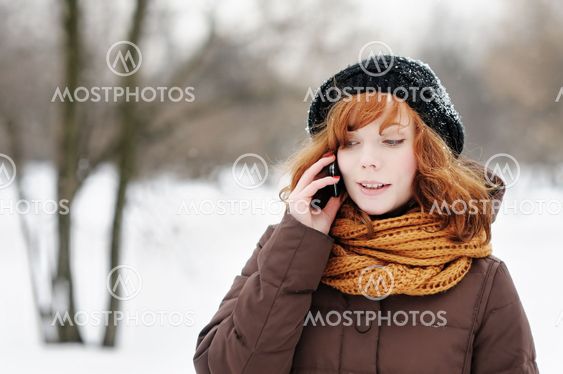Young beautiful woman in winter