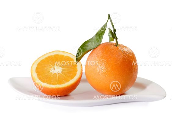 Fresh Oranges on a plate