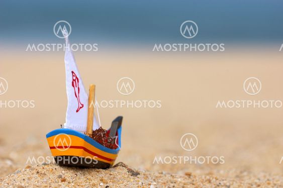 Small wooden fishing boat toy