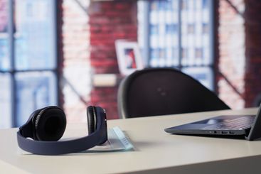 High end home office in a trendy loft apartment with an...