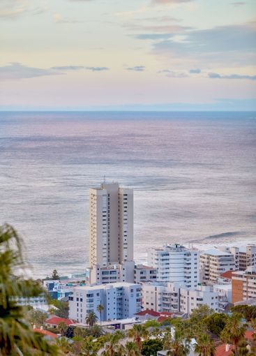 Above, beach and city with coastline, holiday and...