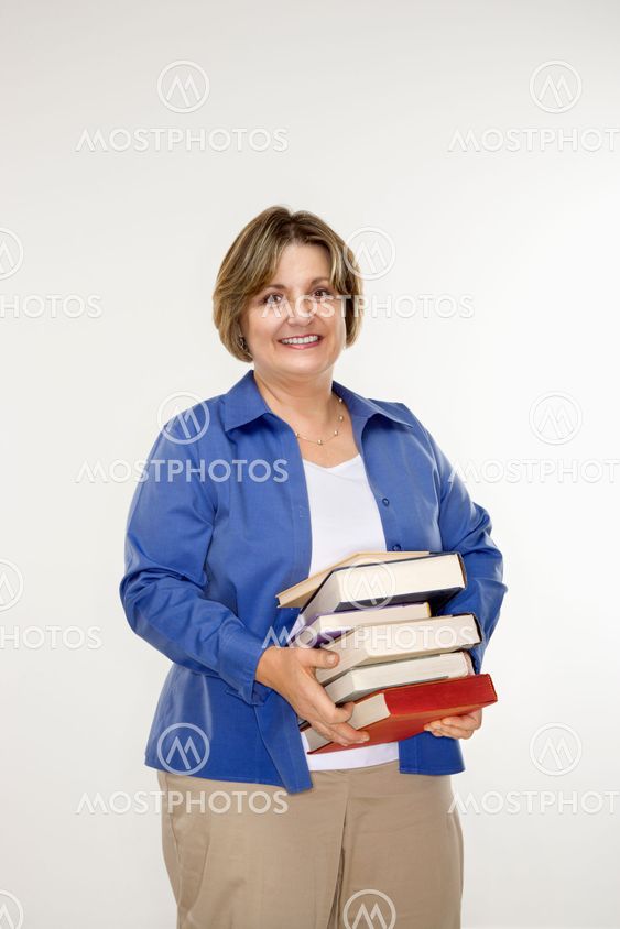 Woman holding books.