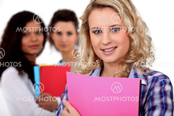 Students stood with folders