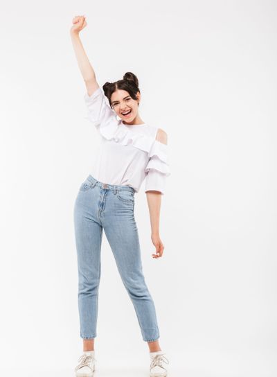 Full length photo of amusing cheerful girl 20s with...