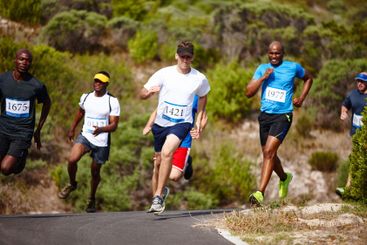 Marathon, men and running group in road with competition...