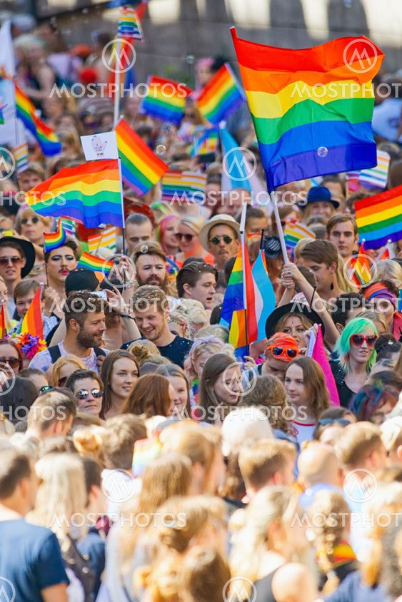 Big crowd walking with the Pride parade
