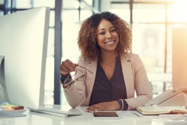 Happy, portrait and business woman with computer or...