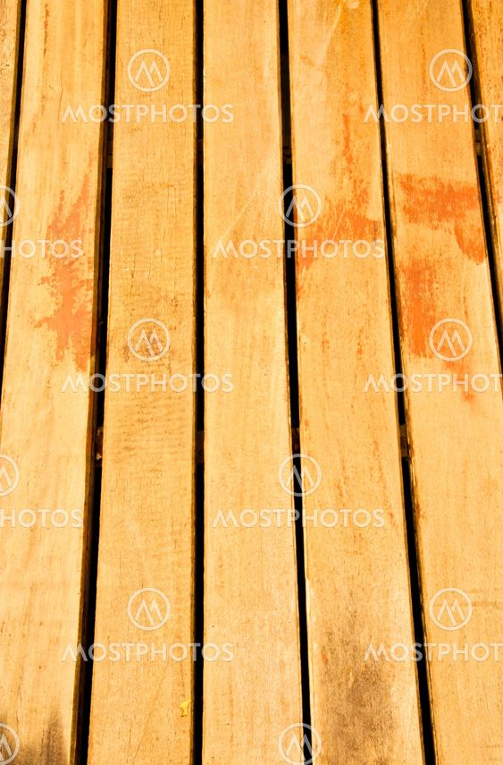 Wood stacked in rows.