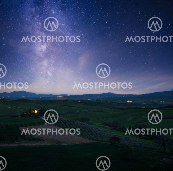 Milky Way Galaxy and Tuscany landscape