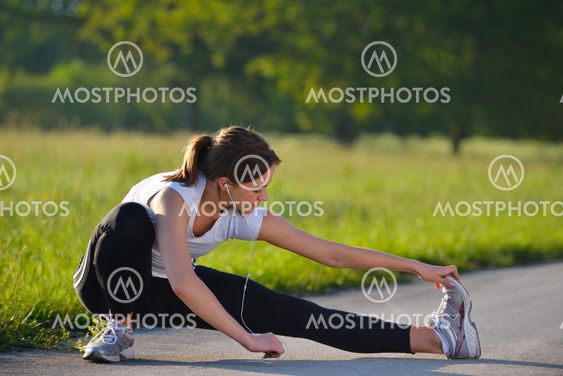 woman stretching before fitness