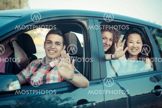 Boys and Girls in a Car Leaving for Vacation