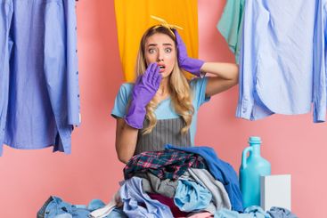 Housewife in laundry. A lot of work during quarantine