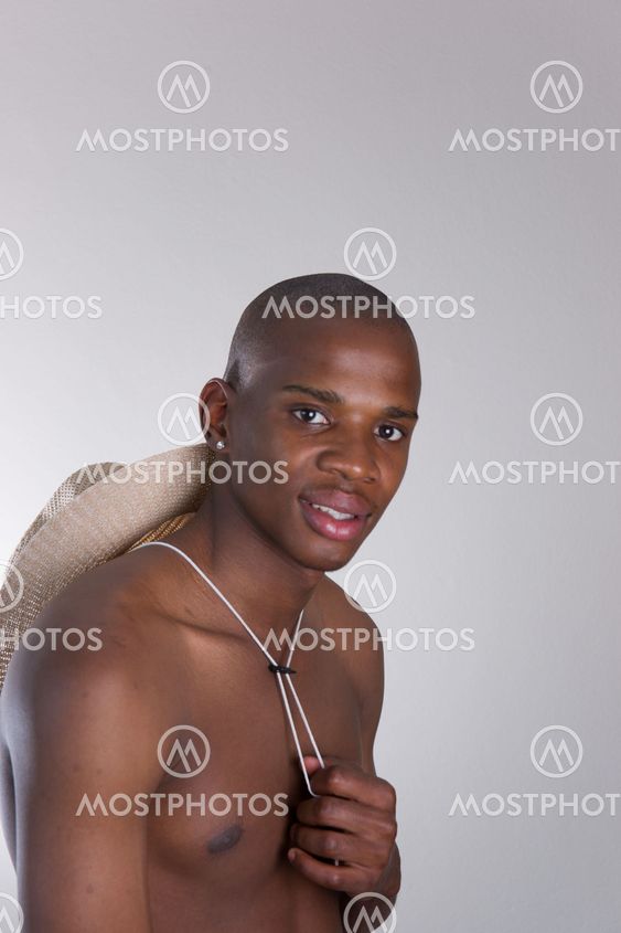 Handsome shirtless African man