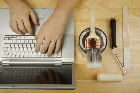 Handyman Using Laptop