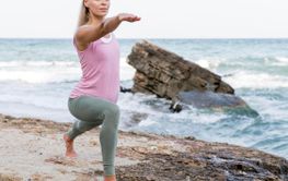beautiful blonde woman doing yoga beach 6