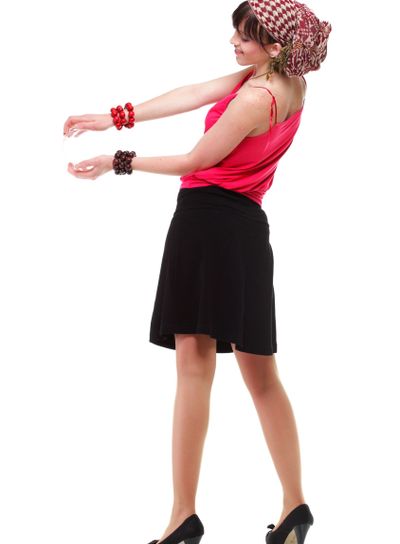 Full length woman in a turban isolated