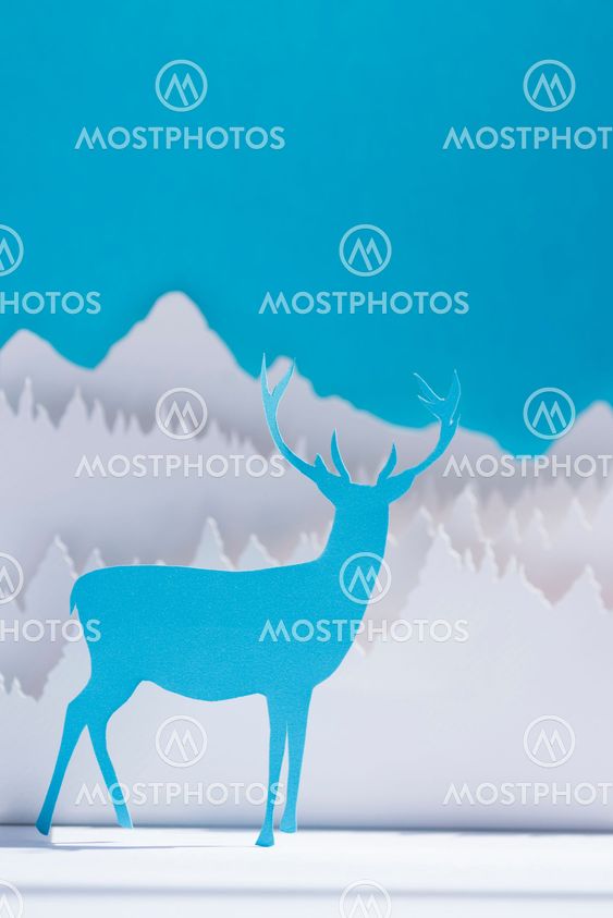 Paper cut deer handmade craft holiday blue card