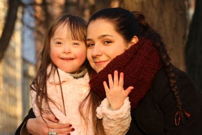 Portrait of beautiful young girl on the playground