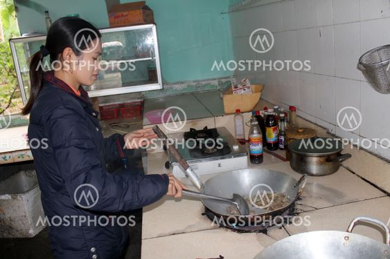 Female chef process fried cicadas