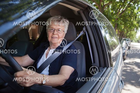 Old woman driving car