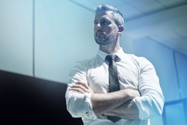 Professional, man and thinking with arms crossed in...