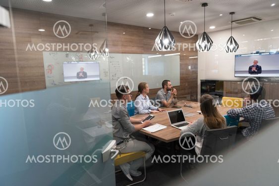 start up business people group attending videoconference call
