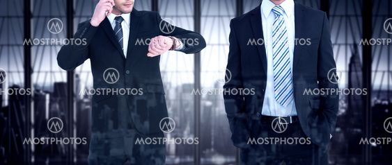 Composite image of smiling elegant businessman with hands in pockets