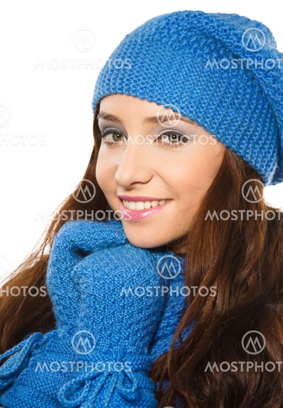 Young happy woman wearing winter cloth