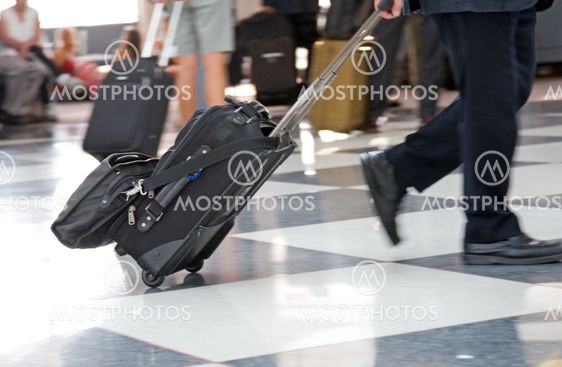 Airport Terminal and Travellers