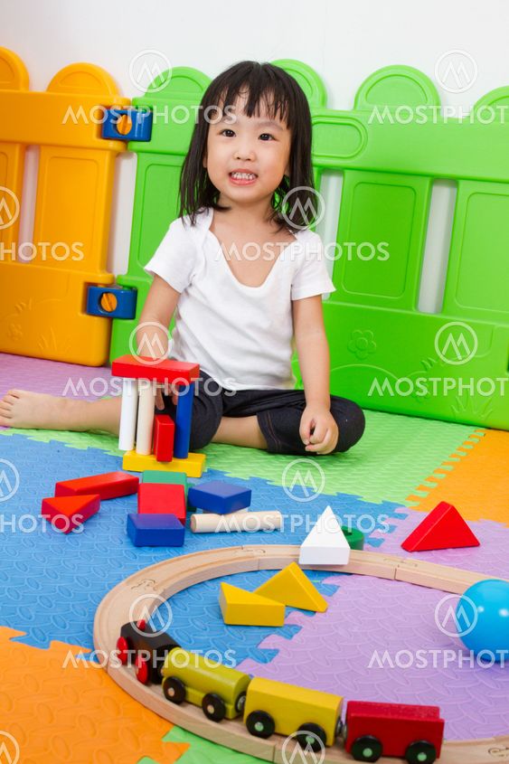 Asian Chinese children playing with blocks