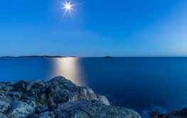 Rocks on coast during sunset