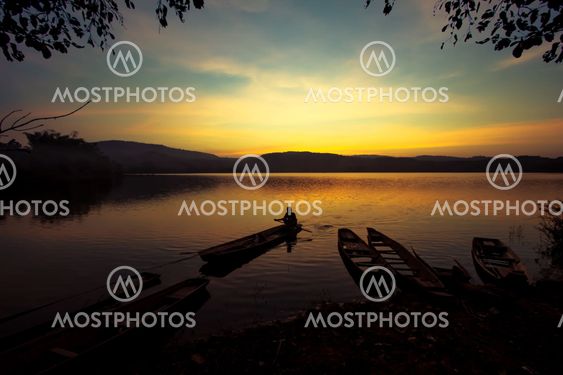 small boat and fisherman