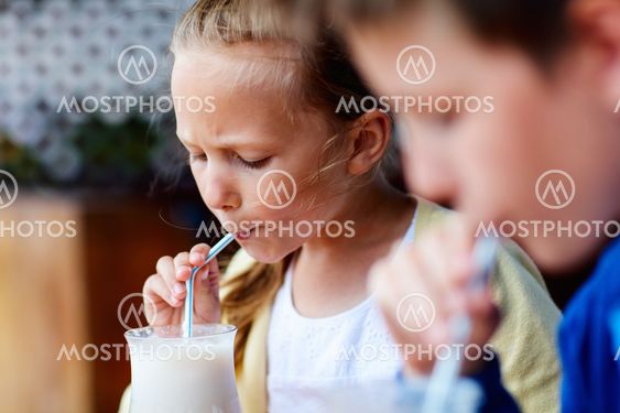Kids drinking milkshakes