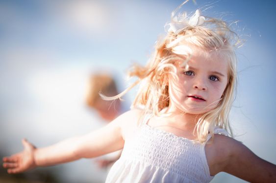 Adorable Blue Eyed Girl Playing Outside