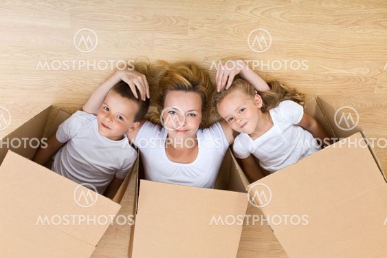 Happy family unpacking