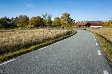 Fall season in Swedish countryside, Narrow asphalt 