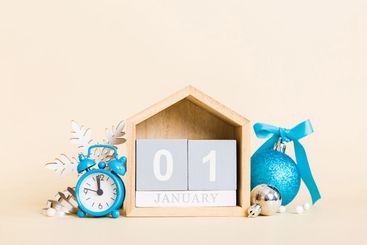 1 january. Christmas composition on colored background...