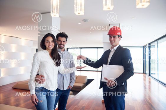 couple buying new home with real estate agent