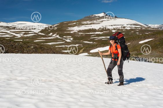 Woman hiking in swedish mountain area