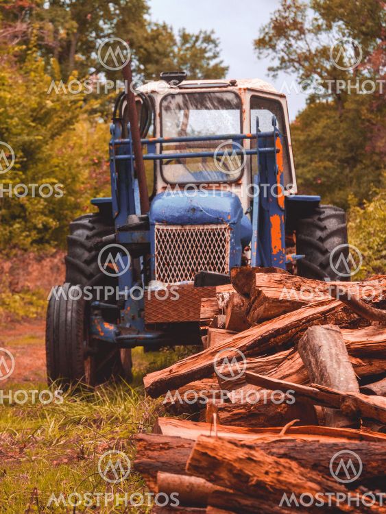 Tractor and log stack