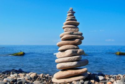 Balanced stones on the seashore