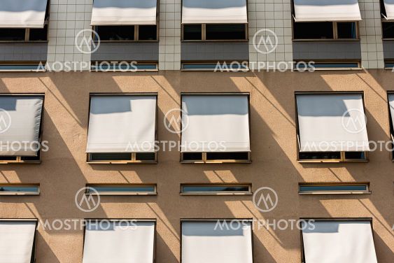 Sun shade on windows of an office building.