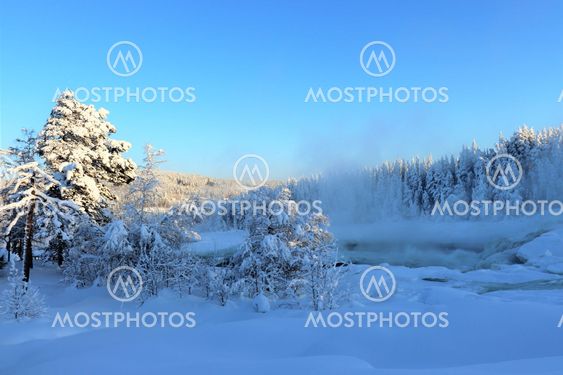 Storforsen i sagolikt vinterlanskap