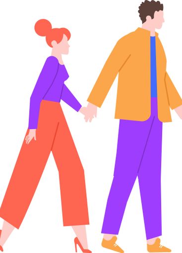 Young couple holding hands and walking together,...