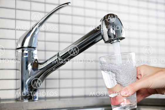 Filling glass of tap water