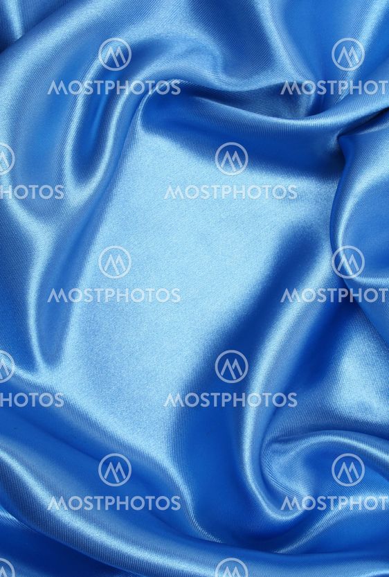 Smooth elegant blue silk as background