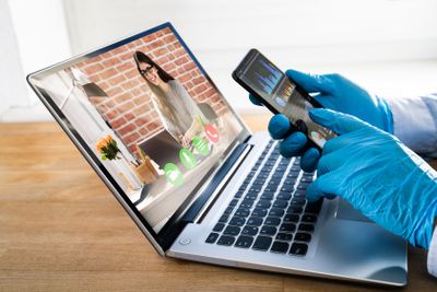 Man On Coronavirus Quarantine Using Video Conference